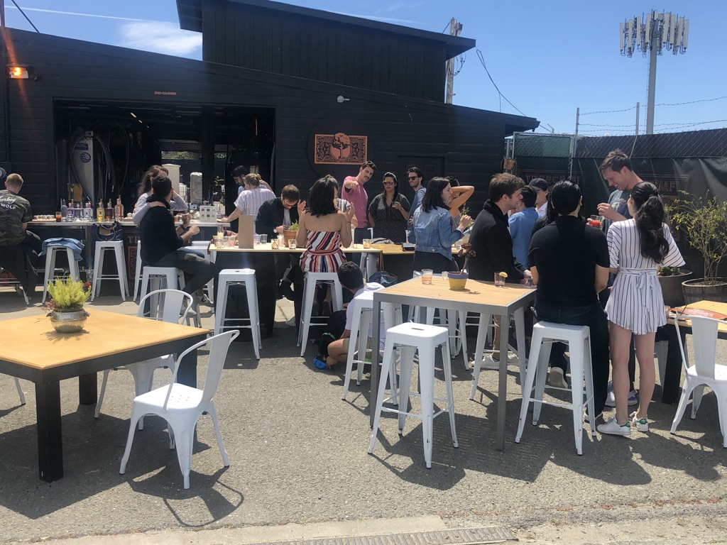 Customers gathering at the outdoor tasting room.
